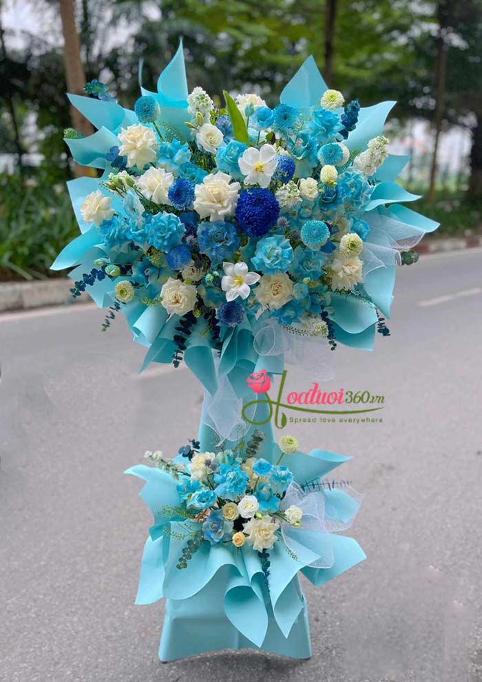 Kệ hoa khai trương tone xanh cá chép hóa rồng