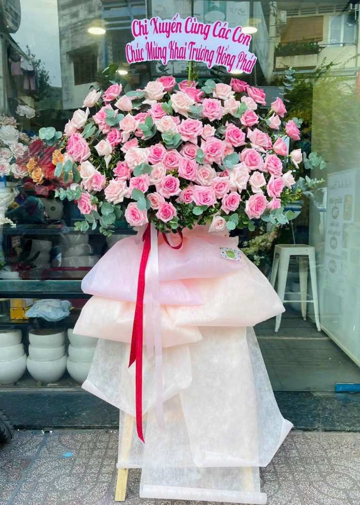Kệ hoa chúc mừng khai trương spa 1 tầng tone hồng đỏ